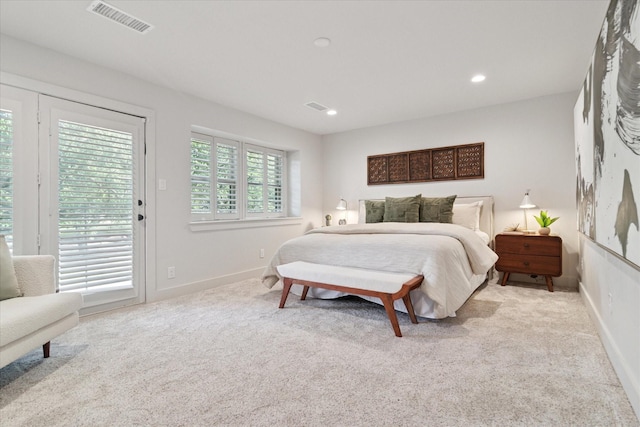 bedroom with baseboards, access to outside, carpet, and visible vents