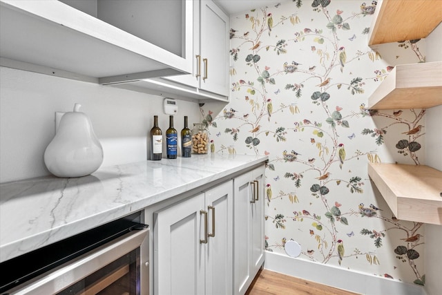 3219 Bryan St, Dallas, TX 75204 - indoor dry bar with beverage cooler and light wood-style floors