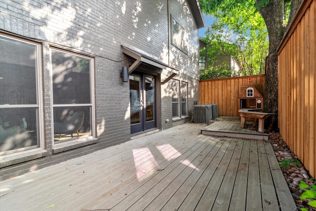 wooden terrace with central air condition unit
