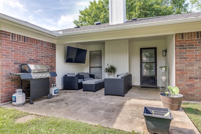 view of patio featuring an outdoor living space and a grill