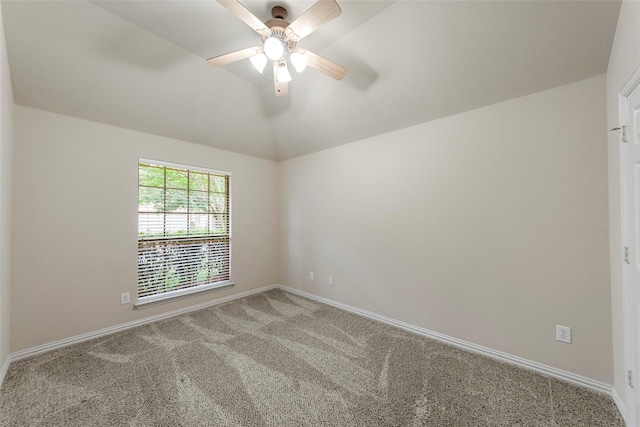 unfurnished room featuring baseboards, vaulted ceiling, ceiling fan, and carpet