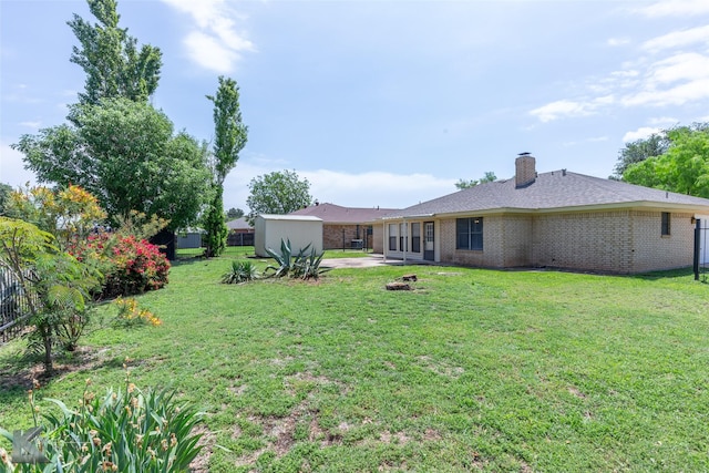view of yard with a patio and fence