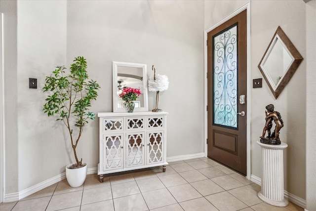 11308 Hubbard Creek Dr, Frisco, TX 75036 - foyer entrance featuring light tile patterned flooring and baseboards