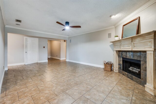 2909 Chisholm Trl, Corinth, TX 76210 - unfurnished living room featuring ceiling fan, a textured ceiling, a fireplace, ornamental molding, and baseboards