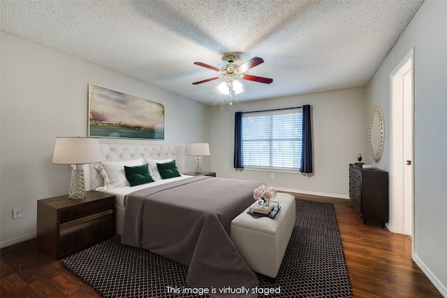 2909 Chisholm Trl, Corinth, TX 76210 - bedroom featuring wood finished floors, baseboards, a ceiling fan, and a textured ceiling