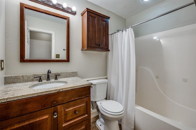 2909 Chisholm Trl, Corinth, TX 76210 - bathroom featuring toilet, vanity, and shower / bath combo with shower curtain