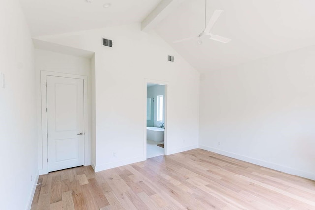 unfurnished bedroom with visible vents, light wood-type flooring, baseboards, and beamed ceiling