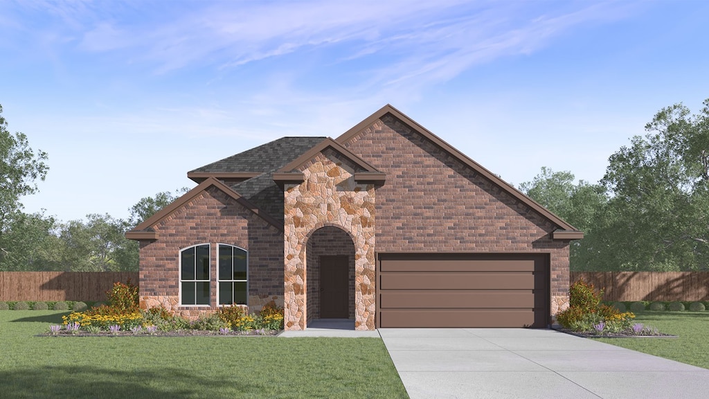 french country inspired facade featuring an attached garage, fence, driveway, and a front lawn
