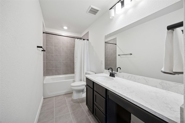 full bathroom featuring shower / bath combination with curtain, visible vents, tile patterned flooring, vanity, and toilet