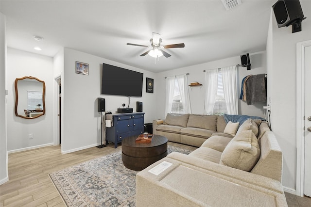 8557 Big Apple Dr, Fort Worth, TX 76179 - living area with light wood-type flooring, baseboards, a ceiling fan, and visible vents