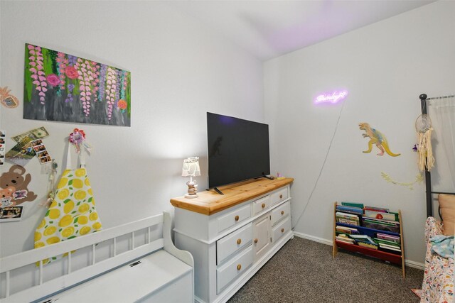 8557 Big Apple Dr, Fort Worth, TX 76179 - bedroom featuring baseboards and dark colored carpet