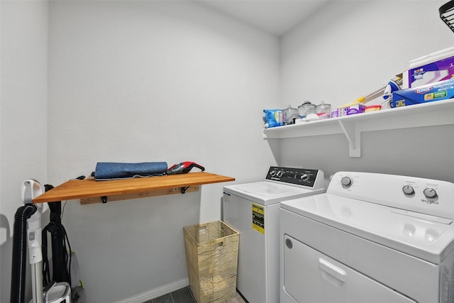 8557 Big Apple Dr, Fort Worth, TX 76179 - laundry room with baseboards, laundry area, and washer and clothes dryer