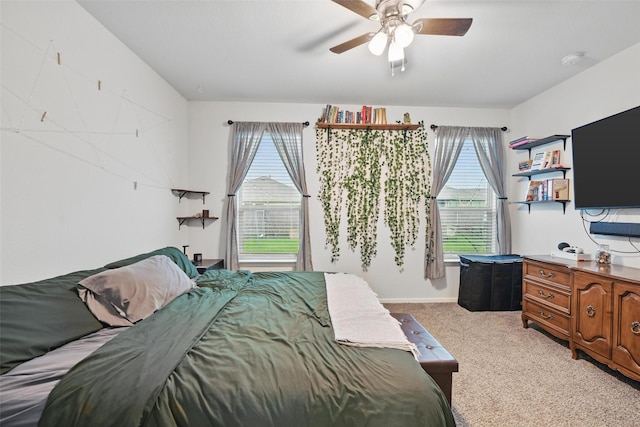 8557 Big Apple Dr, Fort Worth, TX 76179 - bedroom with multiple windows, light carpet, and ceiling fan