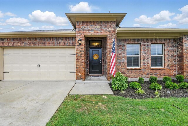 8557 Big Apple Dr, Fort Worth, TX 76179 - prairie-style house with brick siding, concrete driveway, and a garage