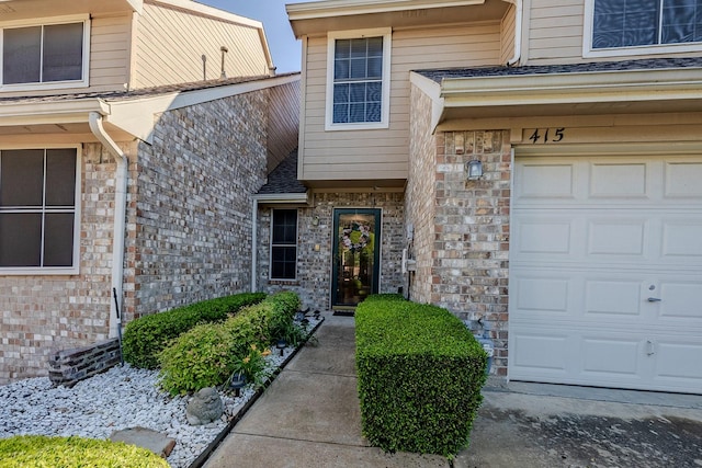 415 Oak Leaf Dr, Duncanville, TX 75137 - view of exterior entry with an attached garage