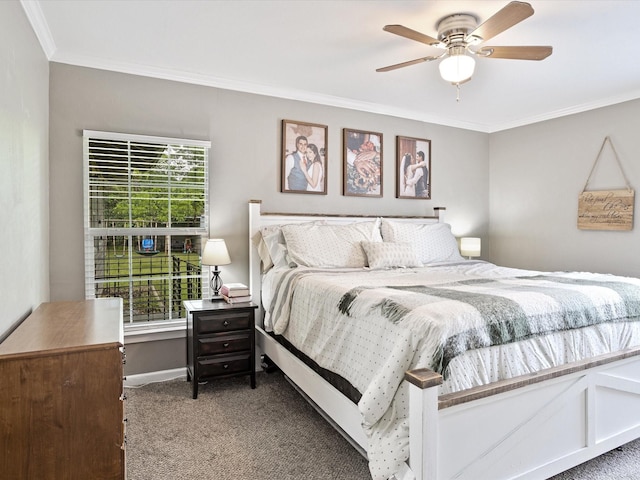 carpeted bedroom featuring baseboards, ornamental molding, and a ceiling fan