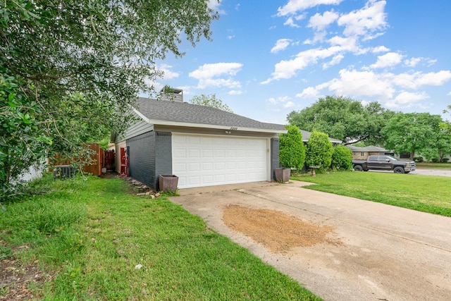 garage with concrete driveway