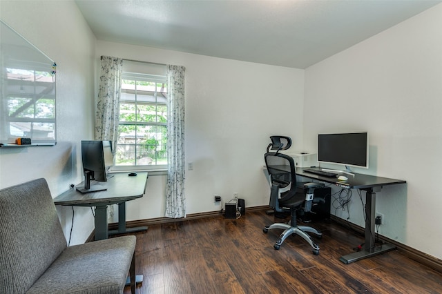 office area with baseboards and wood finished floors