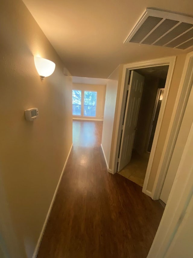 3101 Townbluff Dr Unit 622, Plano, TX 75075 - hallway featuring baseboards, visible vents, and dark wood finished floors