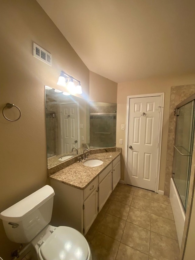 3101 Townbluff Dr Unit 622, Plano, TX 75075 - full bathroom with visible vents, tile patterned flooring, vanity, toilet, and vaulted ceiling