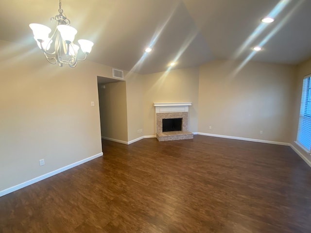3101 Townbluff Dr Unit 622, Plano, TX 75075 - unfurnished living room with a chandelier, visible vents, baseboards, dark wood-style floors, and lofted ceiling