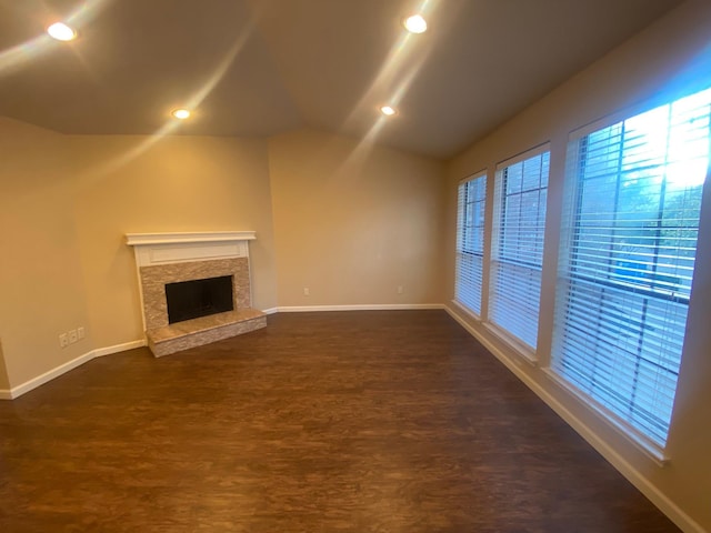3101 Townbluff Dr Unit 622, Plano, TX 75075 - unfurnished living room featuring a healthy amount of sunlight, baseboards, and dark wood finished floors