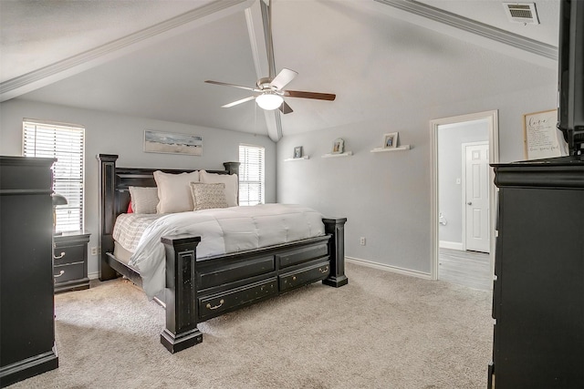 carpeted bedroom featuring visible vents, lofted ceiling with beams, and multiple windows