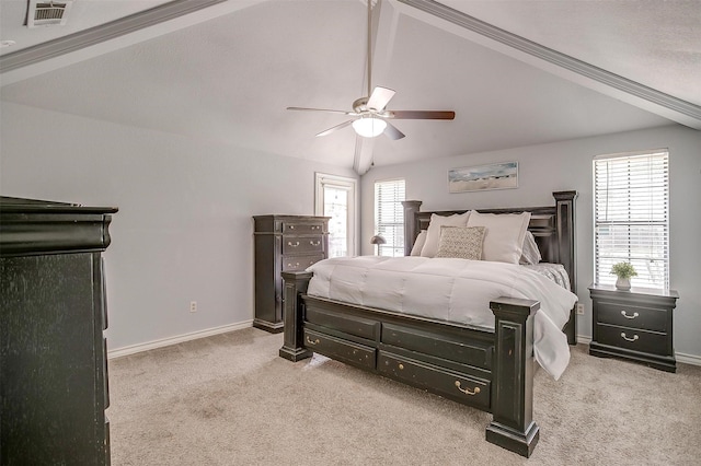 bedroom with light colored carpet, baseboards, visible vents, and vaulted ceiling with beams
