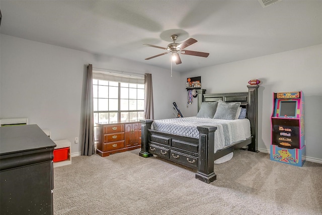 bedroom featuring carpet floors, ceiling fan, and baseboards
