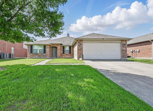 2011 Kalgary Ln, Grand Prairie, TX 75052 - ranch-style home featuring driveway, an attached garage, a front yard, and brick siding