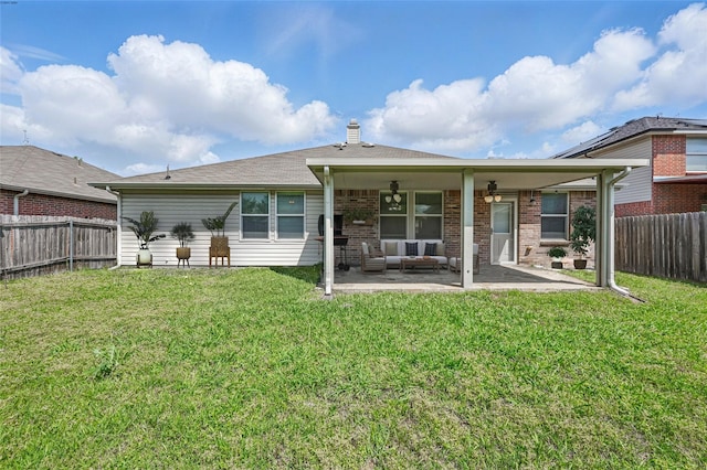 2011 Kalgary Ln, Grand Prairie, TX 75052 - rear view of property featuring a chimney, an outdoor living space, and a patio