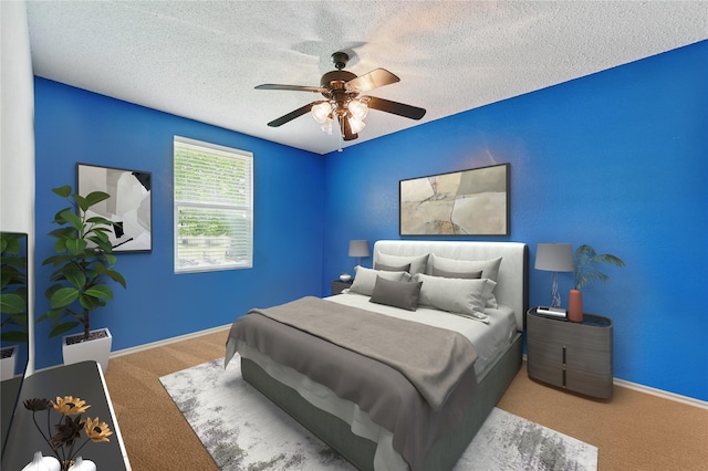 2011 Kalgary Ln, Grand Prairie, TX 75052 - bedroom with carpet, a textured ceiling, ceiling fan, and baseboards