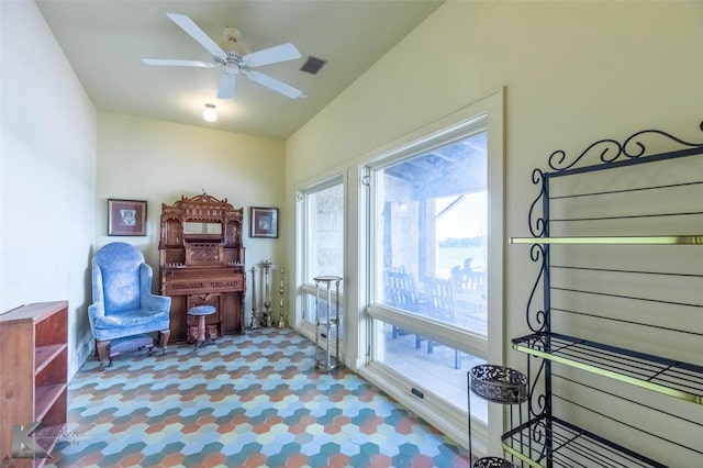990 County Road 621, Tuscola, TX 79562 - living area featuring a ceiling fan and visible vents