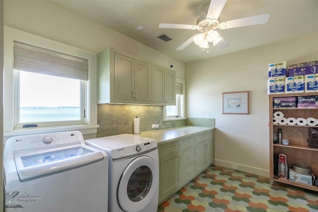 990 County Road 621, Tuscola, TX 79562 - laundry area with visible vents, baseboards, washing machine and clothes dryer, a ceiling fan, and cabinet space