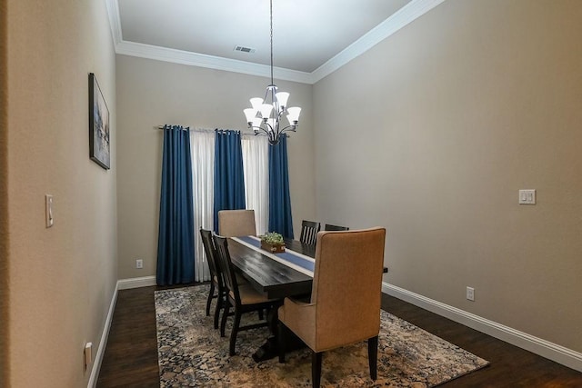 dining area with baseboards, a notable chandelier, dark wood-style floors, and ornamental molding