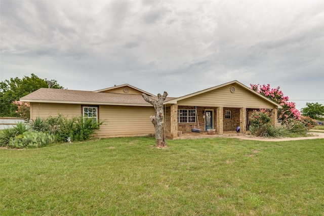 5313 Old Buena Vista Rd, Waxahachie, TX 75167 - ranch-style home featuring covered porch, brick siding, and a front yard