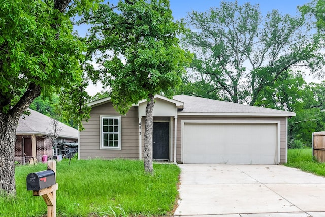 view of front of home with an attached garage and concrete driveway