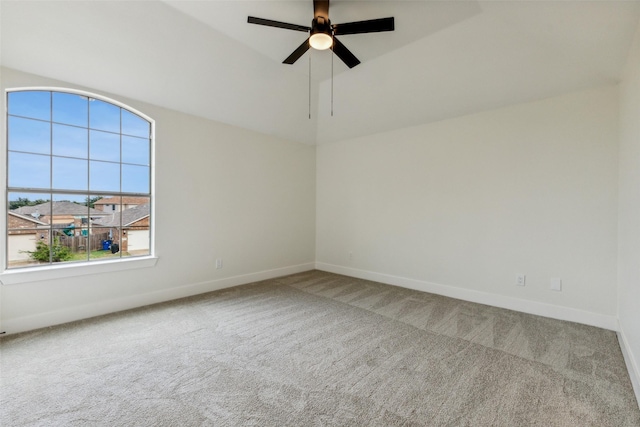 empty room with baseboards, carpet flooring, and a wealth of natural light