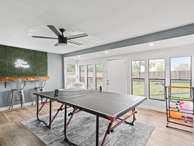 playroom featuring recessed lighting, light wood-style flooring, and baseboards