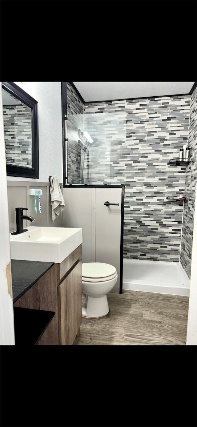 111 Circle Dr, Bogata, TX 75417 - bathroom with a walk in shower, toilet, and vanity