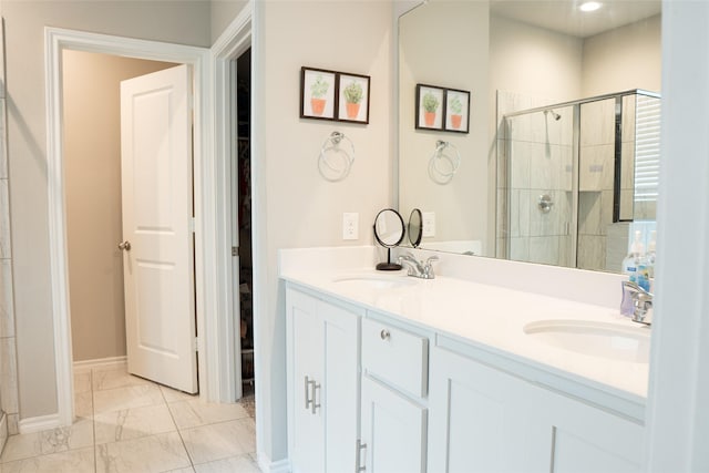 1714 Cecil Crest Ln, Forney, TX 75126 - full bathroom with double vanity, a sink, marble finish floor, and a shower stall
