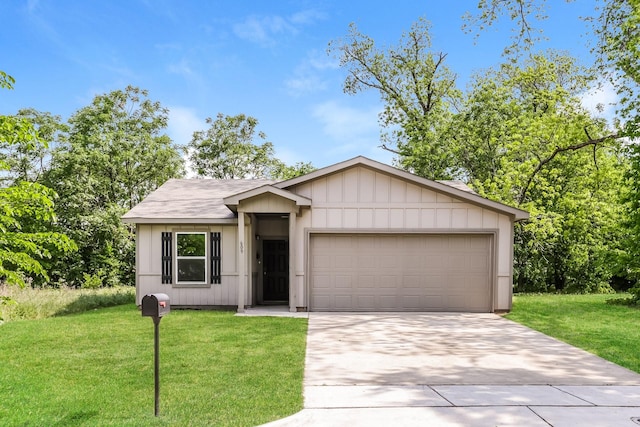 609 Sherman St, Waco, TX 76704 - view of front of home with a garage, a front lawn, and concrete driveway