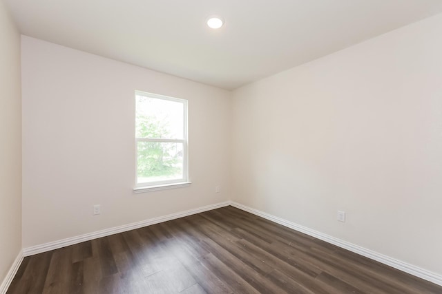 609 Sherman St, Waco, TX 76704 - empty room featuring baseboards and dark wood-style flooring