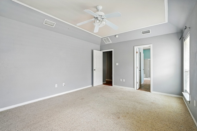unfurnished bedroom with baseboards, visible vents, and carpet