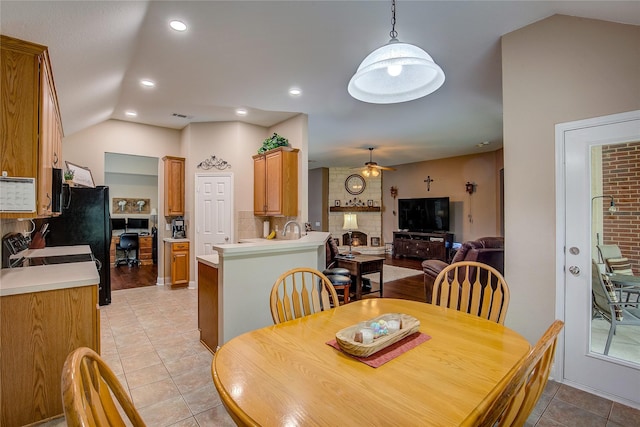 dining room featuring visible vents, lofted ceiling, recessed lighting, a ceiling fan, and light tile patterned floors