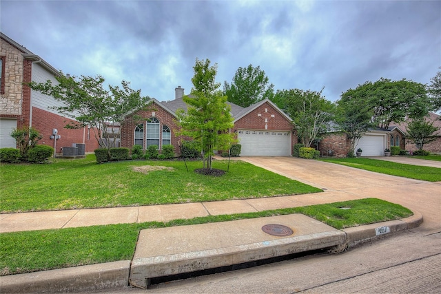 view of front of home featuring central AC, brick siding, a front yard, a chimney, and driveway