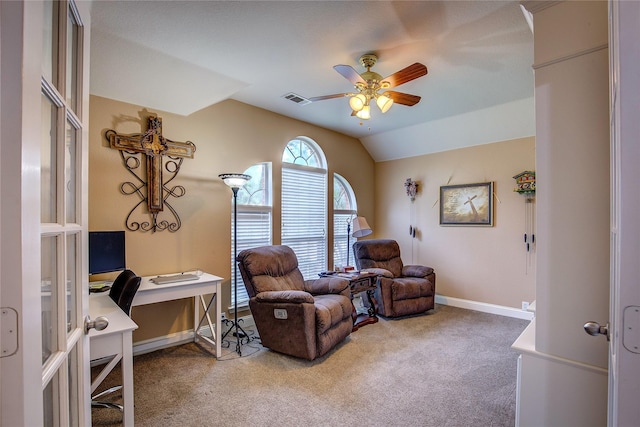 sitting room with visible vents, lofted ceiling, baseboards, ceiling fan, and carpet flooring