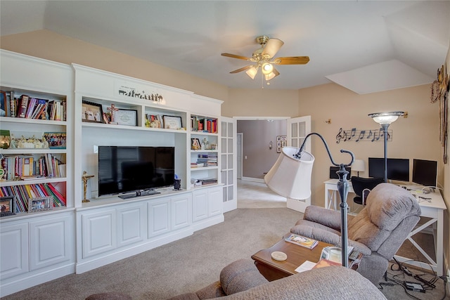 living room with light colored carpet, ceiling fan, and french doors
