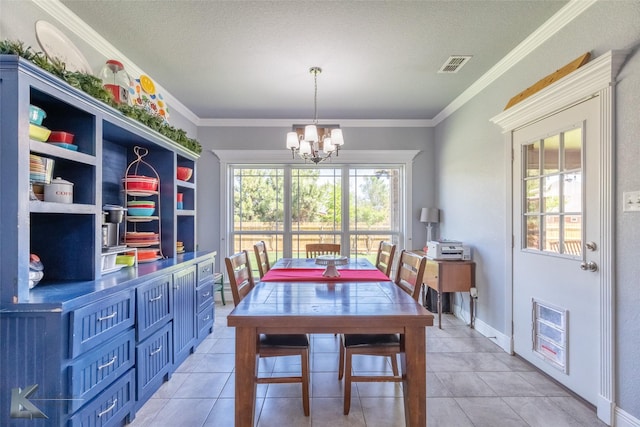 dining area with crown molding, an inviting chandelier, baseboards, light tile patterned floors, and visible vents