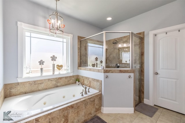 full bath featuring a whirlpool tub, a chandelier, tile patterned flooring, and a stall shower